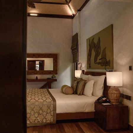 The Banjaran Hotsprings Retreat Hotel Ipoh Exterior foto A bedroom at the resort