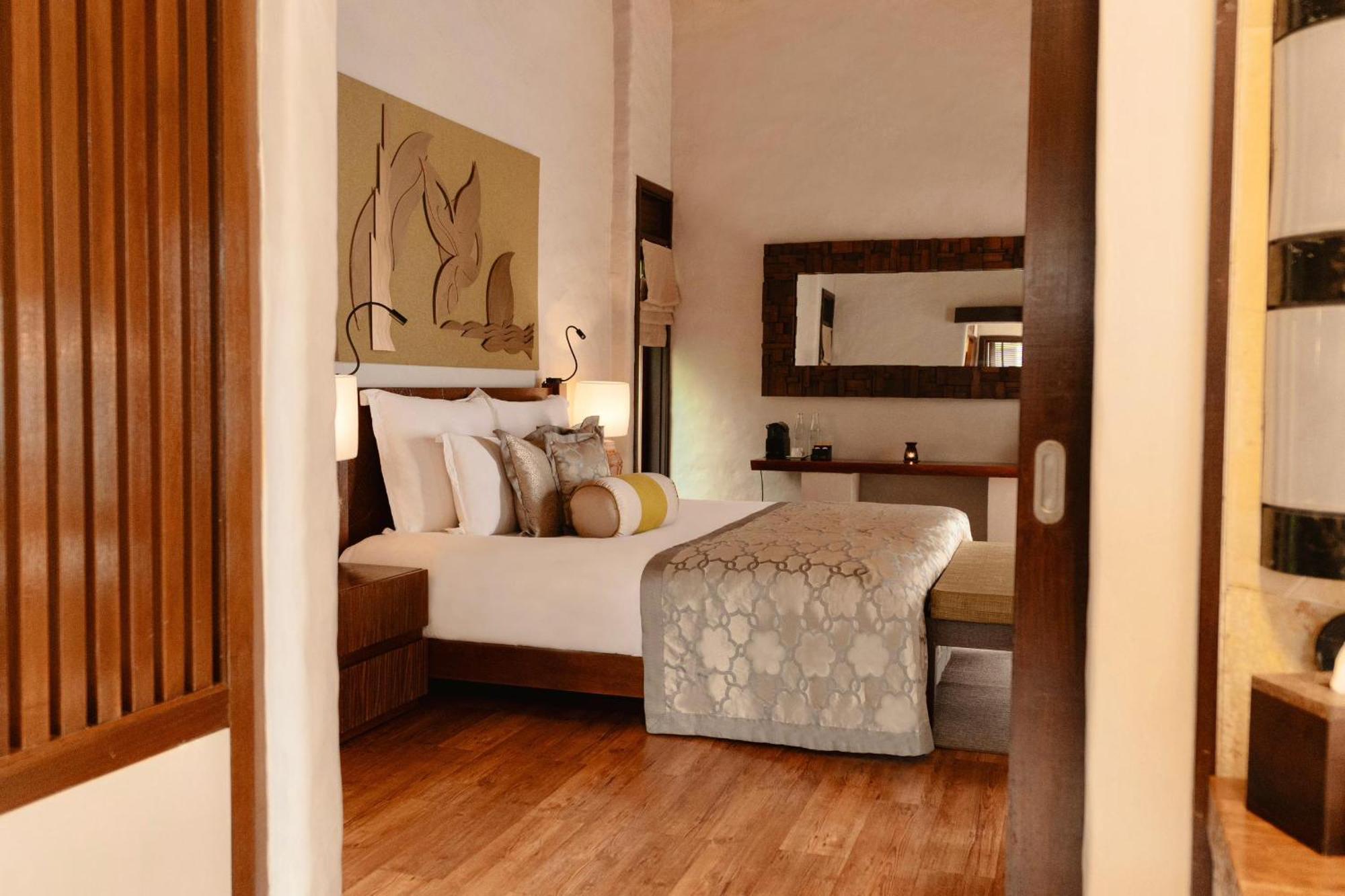 The Banjaran Hotsprings Retreat Hotel Ipoh Exterior foto A bedroom at the Taj Bengal