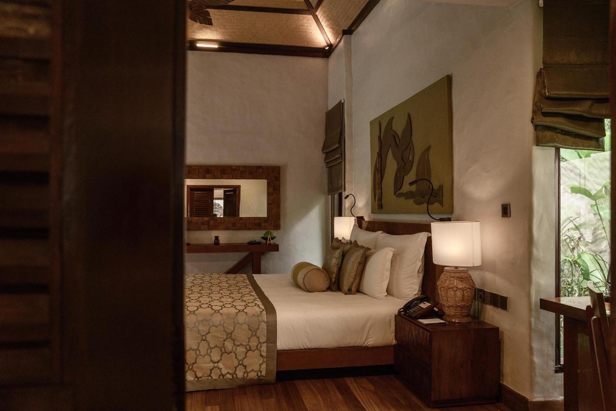 The Banjaran Hotsprings Retreat Hotel Ipoh Exterior foto A bedroom at the resort